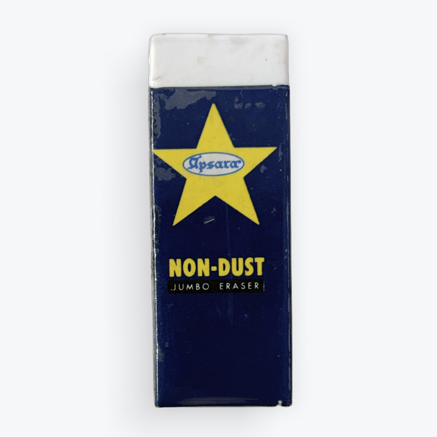 Apsara non-dust jumbo eraser with a dark blue body, a yellow star logo, and a white eraser tip, shown on a clean white background.