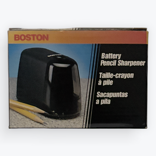 Boston battery pencil sharpener retail box shown against a light gray background. The packaging features a photo of the black pencil sharpener and includes text in English, French, and Spanish.