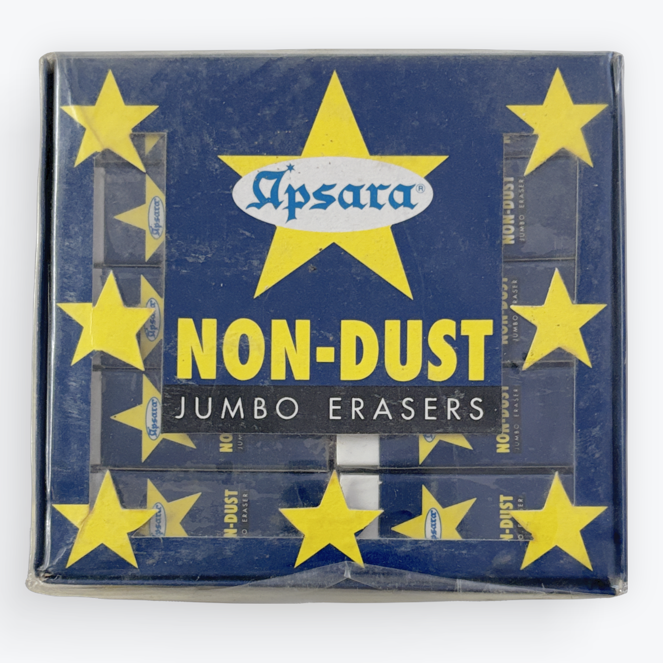 A package of Apsara Non-Dust Jumbo Erasers in a square blue box decorated with yellow stars, shown on a clean white background.