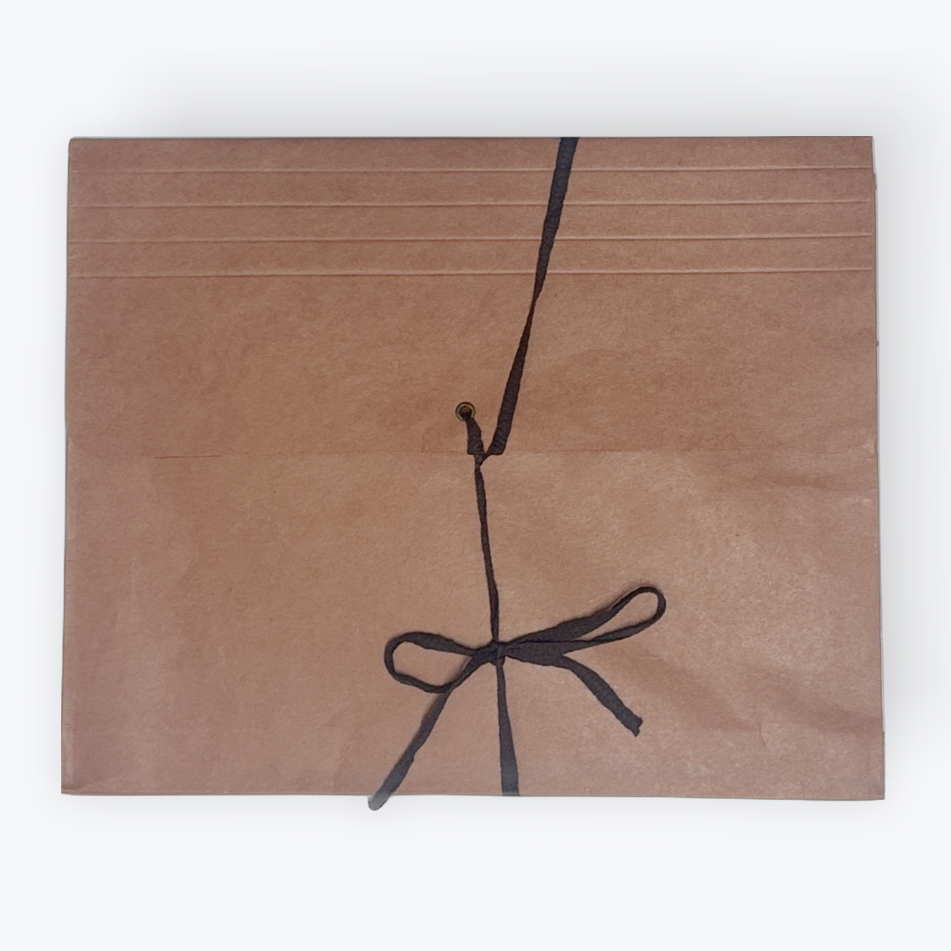 A square brown kraft paper gift box tied with a black ribbon bow, centered on a clean white background.