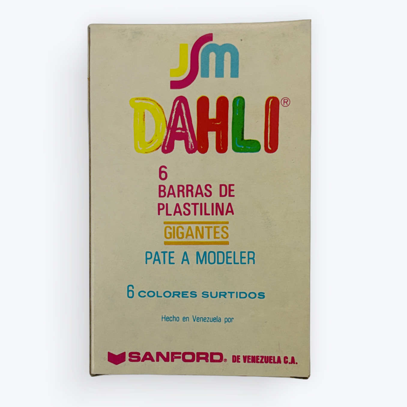 A vintage package of SM Dahli giant plasticine modeling clay sticks, featuring a beige cardboard cover with colorful brand lettering and Spanish text, on a light gray background.