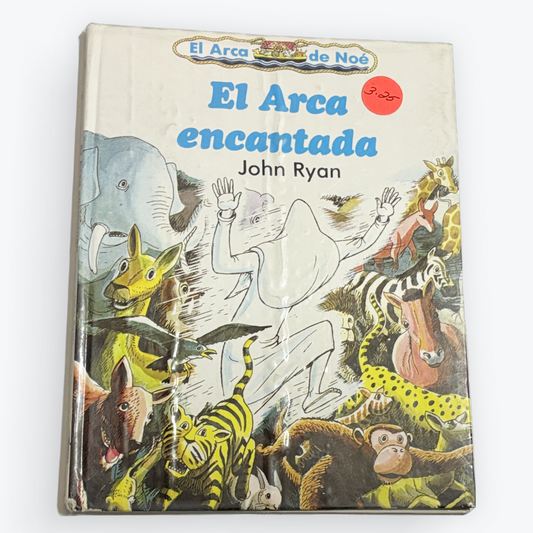 A children's book titled 'El Arca encantada' by John Ryan, featuring a colorful illustration of animals and a white arch on the cover, photographed on a light gray background.