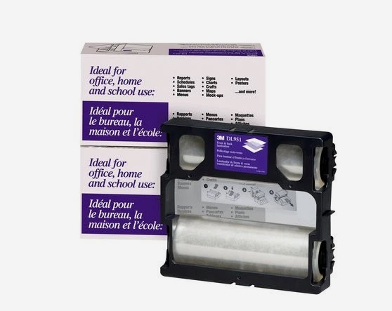 A 3M DELST1 clear adhesive vinyl roll in a black plastic cartridge, shown in front of its white and purple retail box on a light gray background.