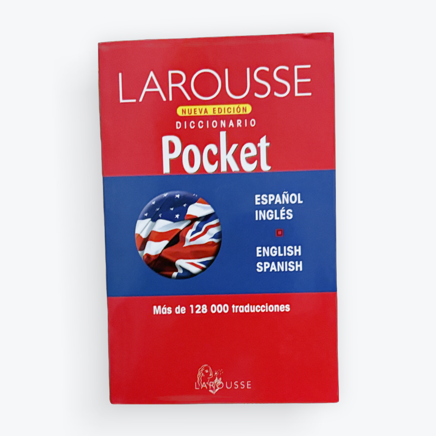 Larousse Pocket Dictionary Spanish-English bilingual edition, featuring a red and blue cover with a circular American flag graphic, shown on a light gray background.